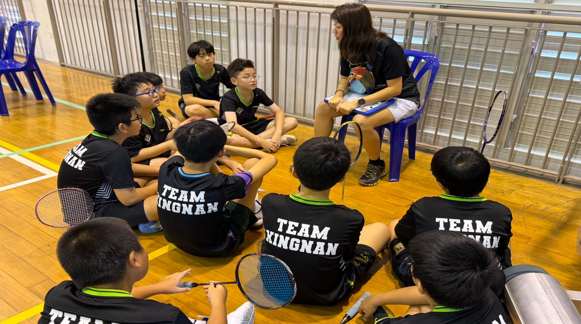 Players come together, ready to give their best while listening to tips and words of advice from teacher in charge.